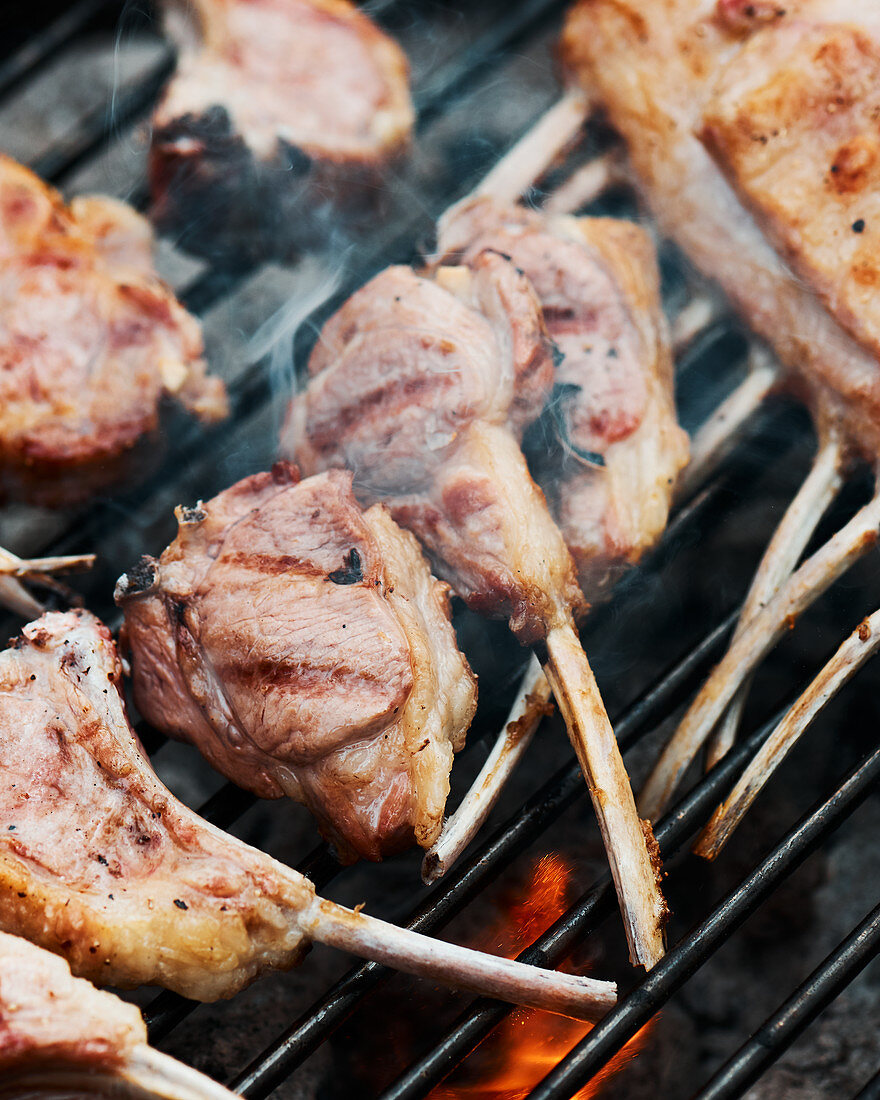 Racks of lamb on a barbecue