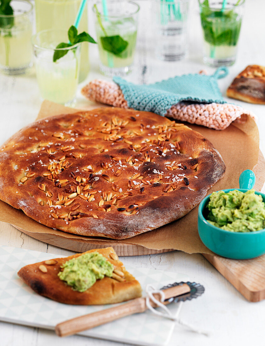 Focaccia with sea salt and pine nuts, with guacamole