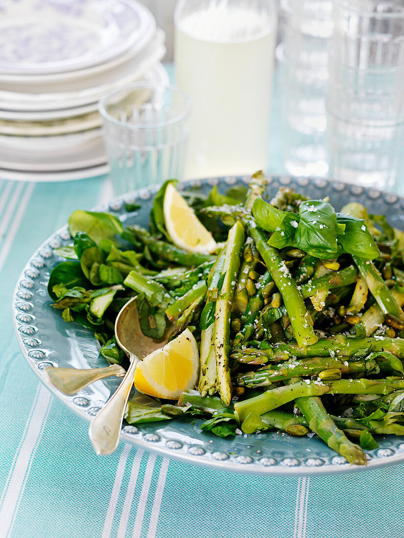 Asparagus salad with green asparagus, lemons and basil