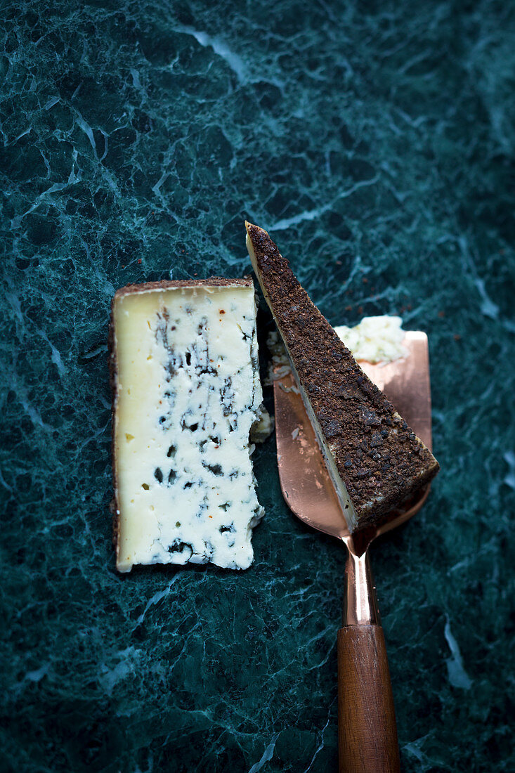 Blue cheese 'Carublu' with a cheese knife (top view)