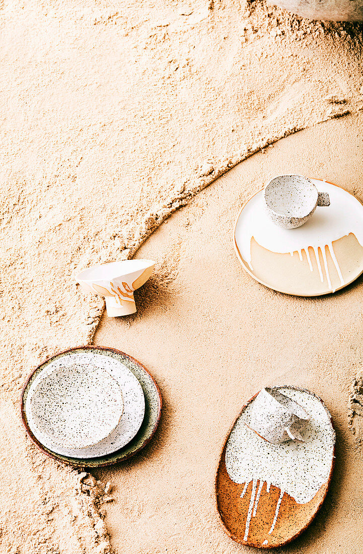 Dishes on sand table