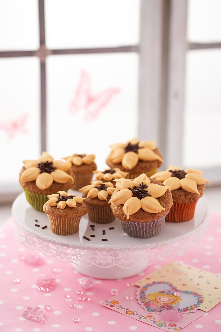 Sunflower muffins on a cake stand