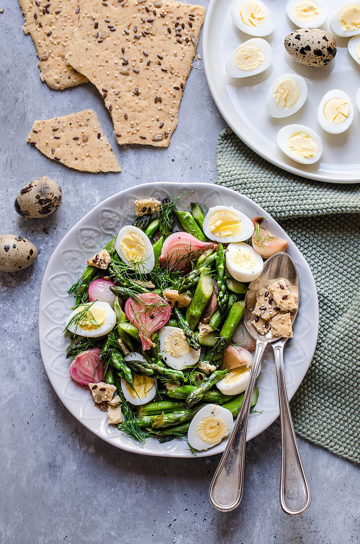 Asparagus and quail egg salad with dried focaccia