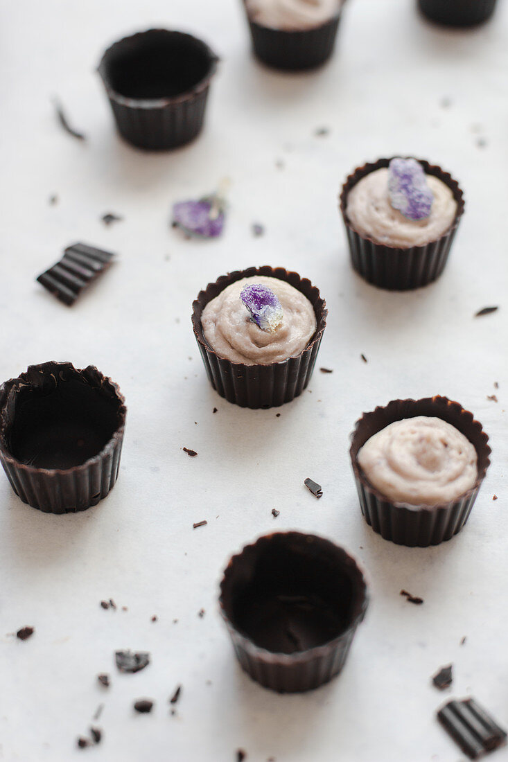 Chocolate buttercups with candied violets