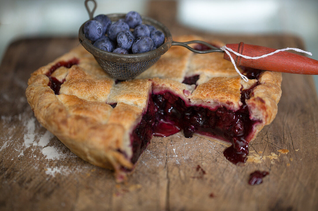 Freshly baked blueberry pie, sliced