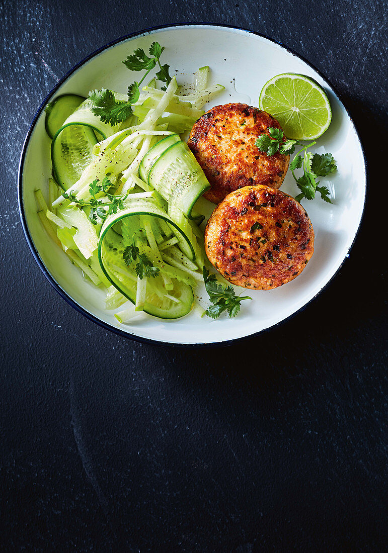 Green curry salmon cakes with cucumber and apple salad