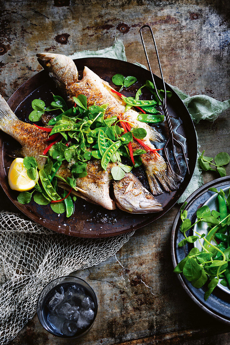 Grilled barramundi with pea salad and eschalot dressing