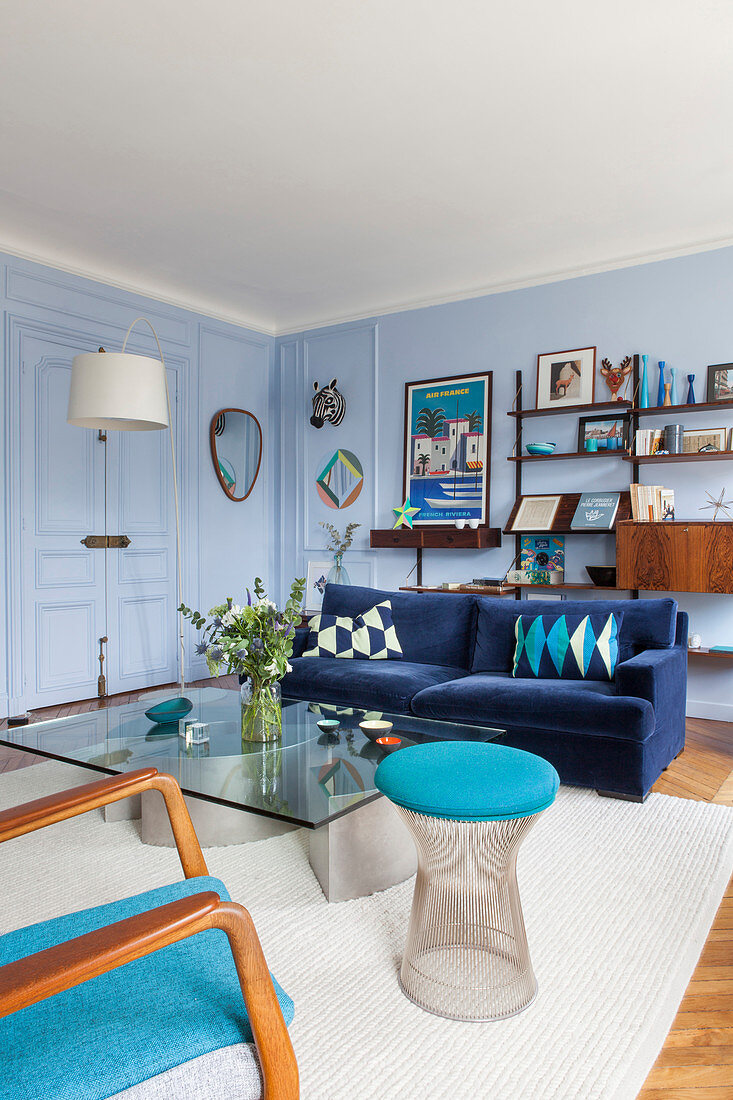 Vintage designer furniture in living room of Parisian period building