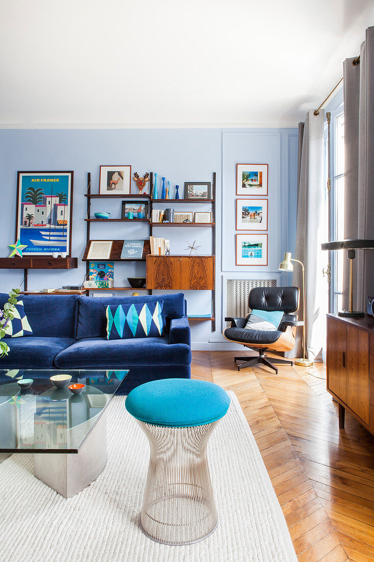 Vintage designer furniture in living room of Parisian period building