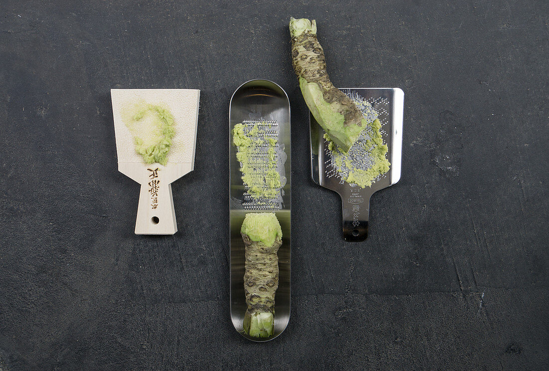 Three types of wasabi with a sharkskin grater and metal graters