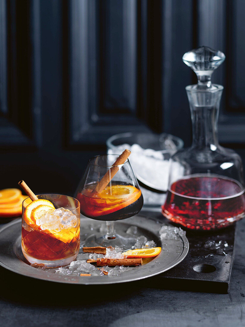 Port wine punch with cinnamon and oranges