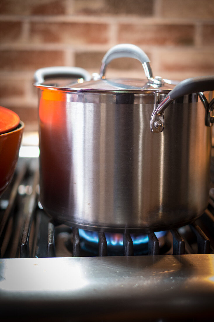 A large pot on a gas hob