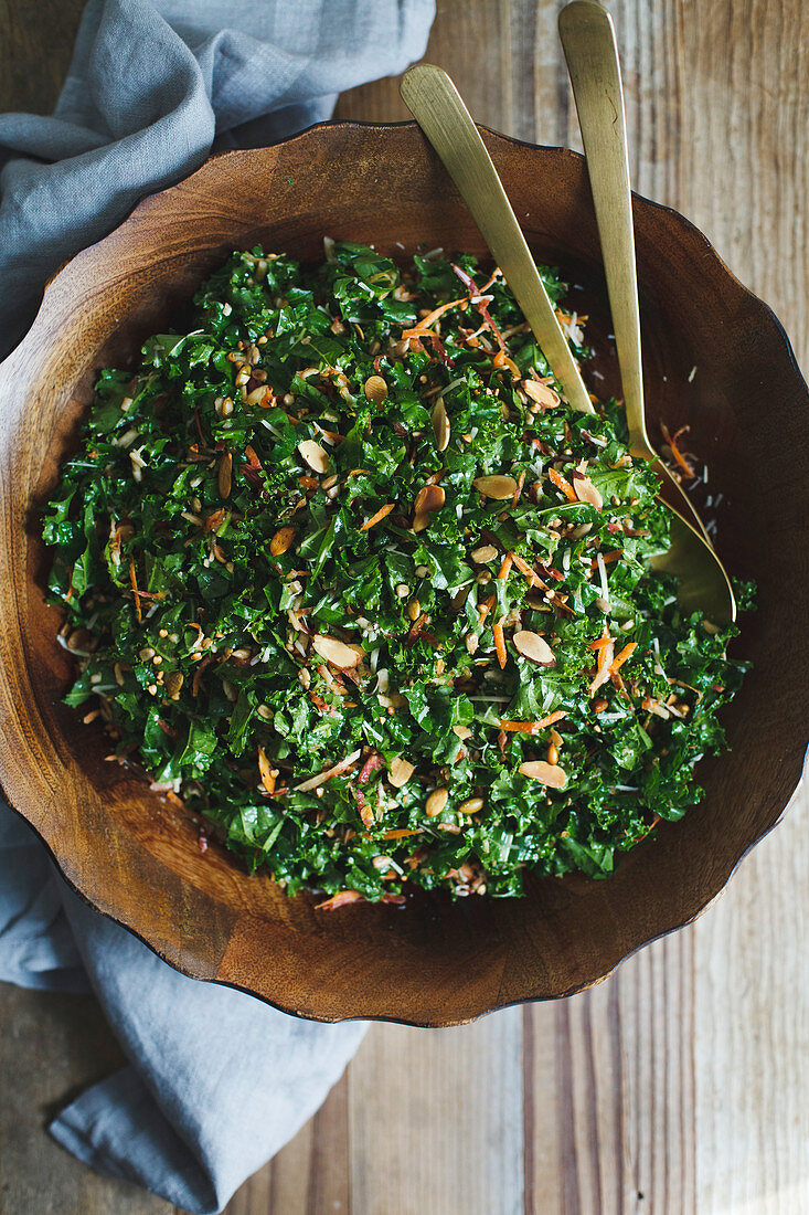 Kale salad on wood board