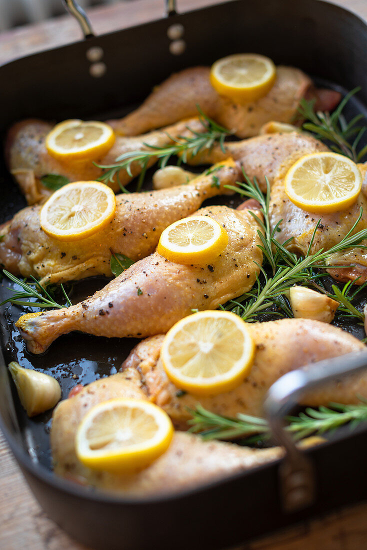 Chicken legs with lemons and rosemary