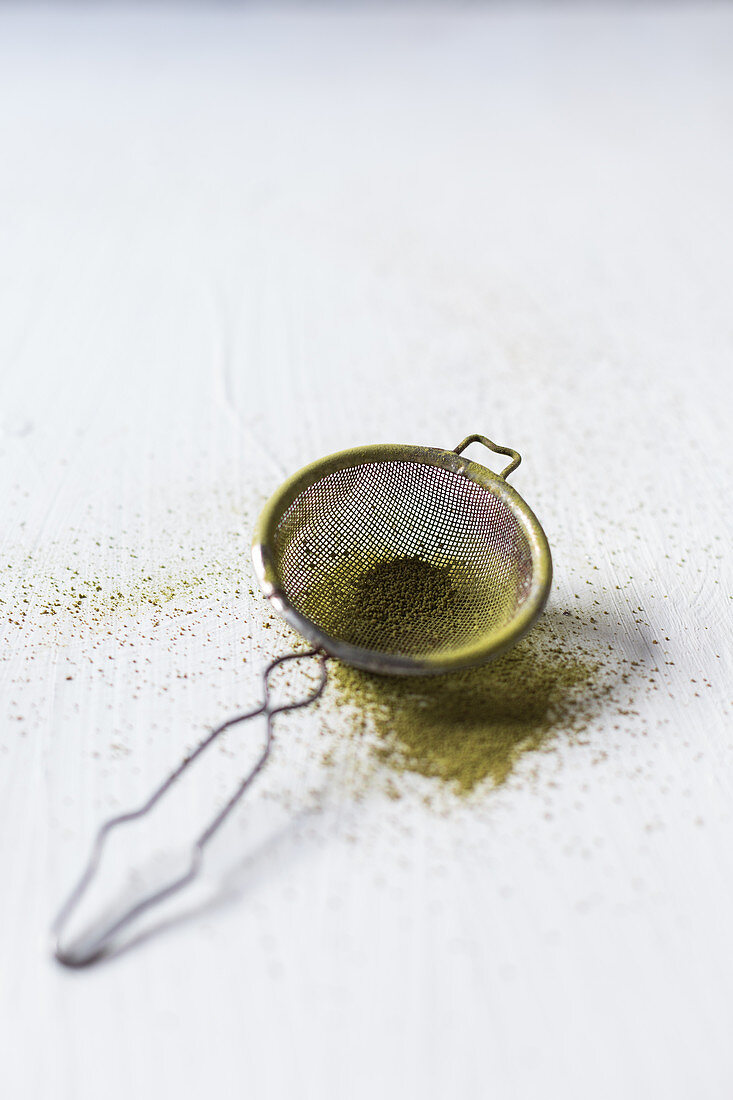 A sieve with matcha powder