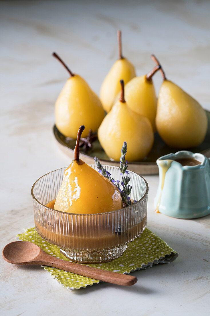 Chai-spiced poached pears with butterscotch coffee sauce