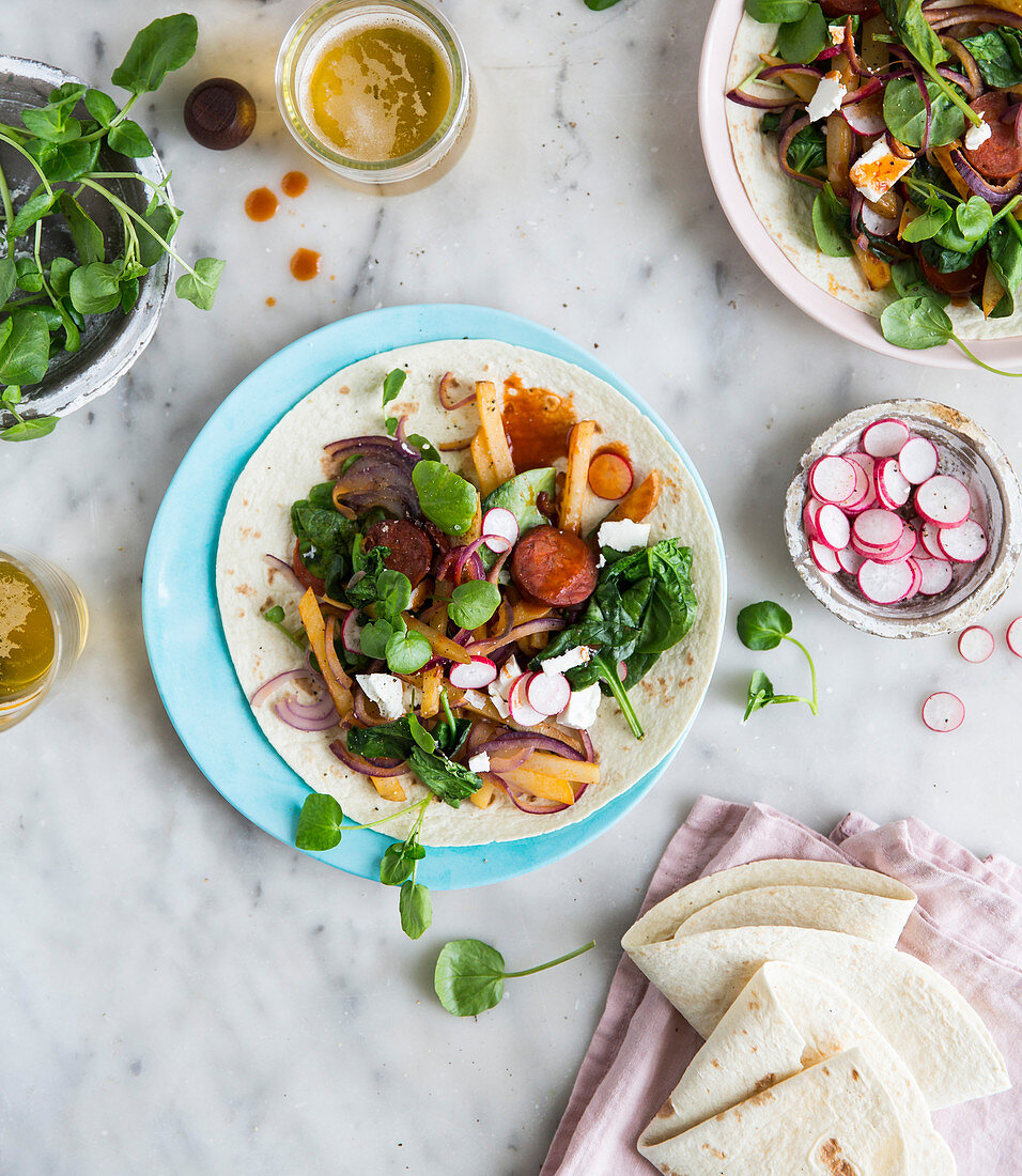 Taco with salad and sausage