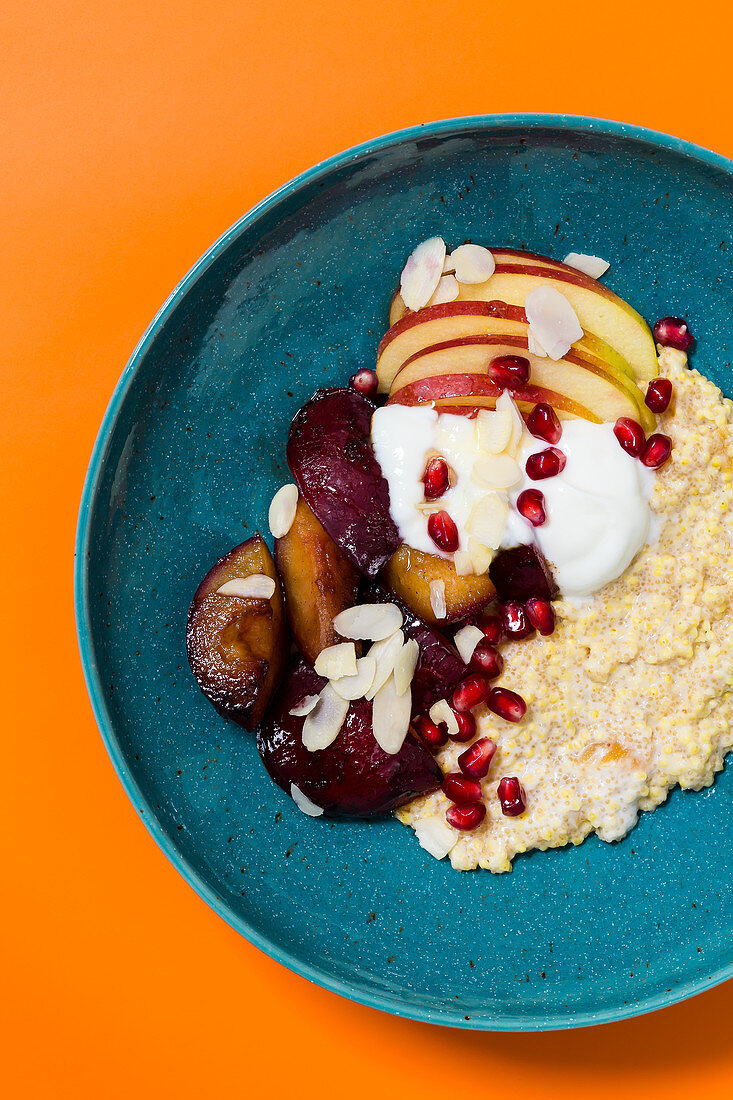 An autumnal breakfast bowl with damsons, cloves and cinnamon
