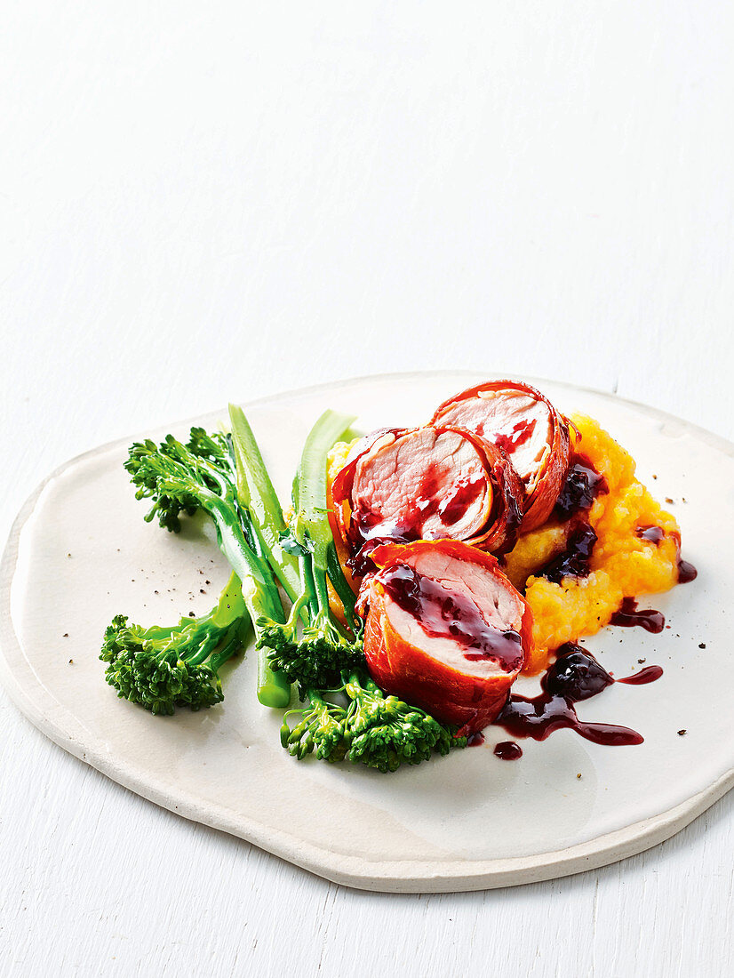 Prosciutto wrapped pork with cherry sauce