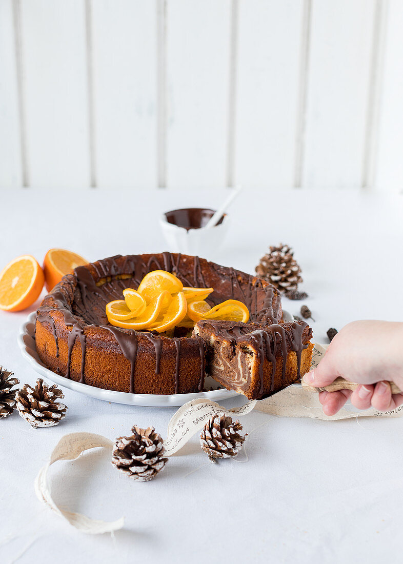 Chocolate orange cheesecake being sliced