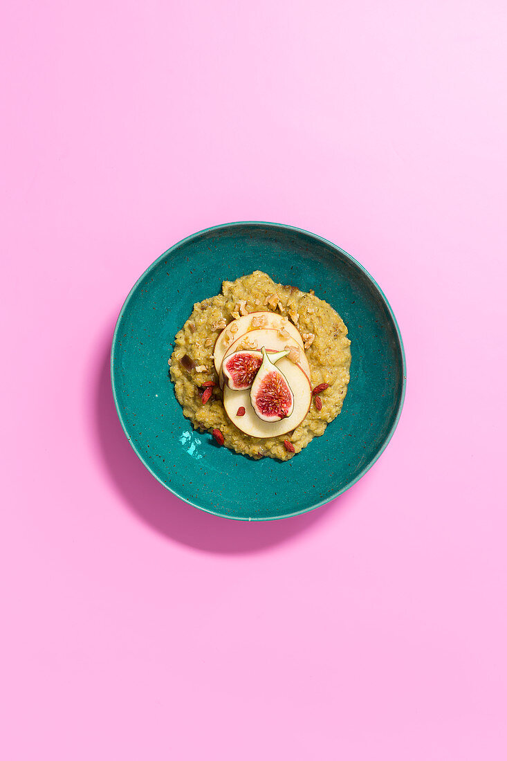 Golden milk porridge bowl with figs