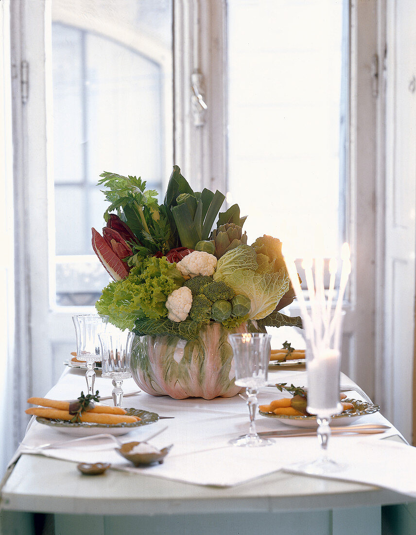 Attractive arrangement of vegetables in bowl on table