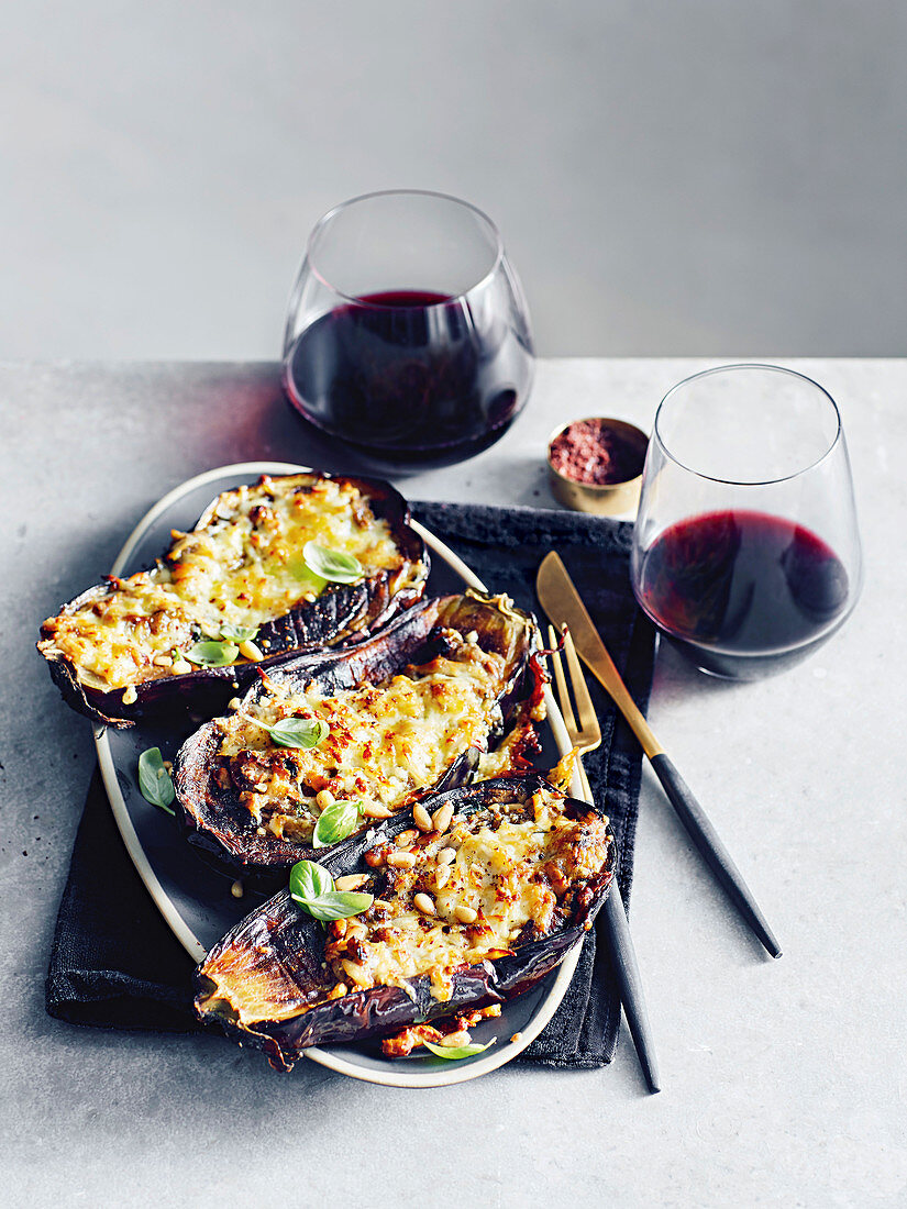 Eggplants stuffed with haloumi, basil and pine nut