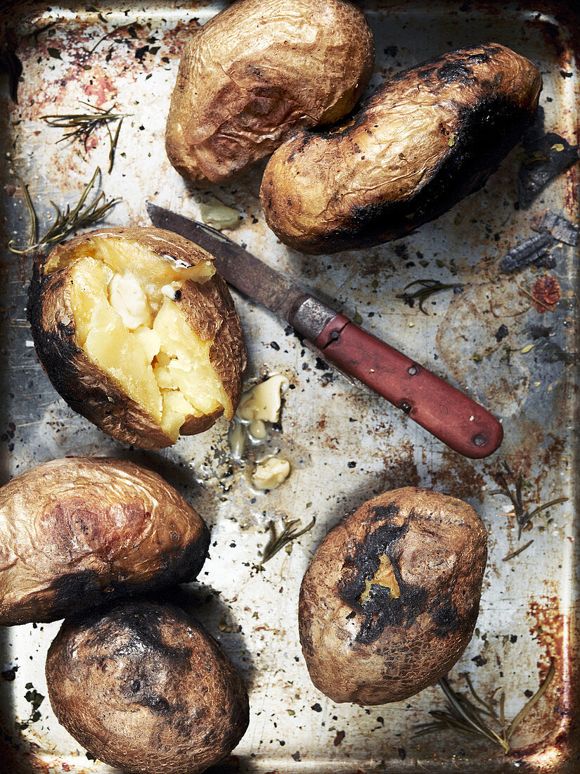 Baked potatoes on a baking sheet