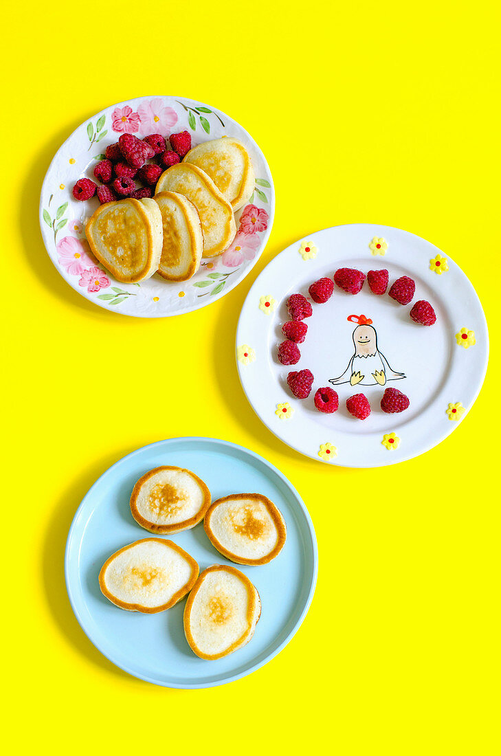 Pancakes with raspberries for breakfast with children