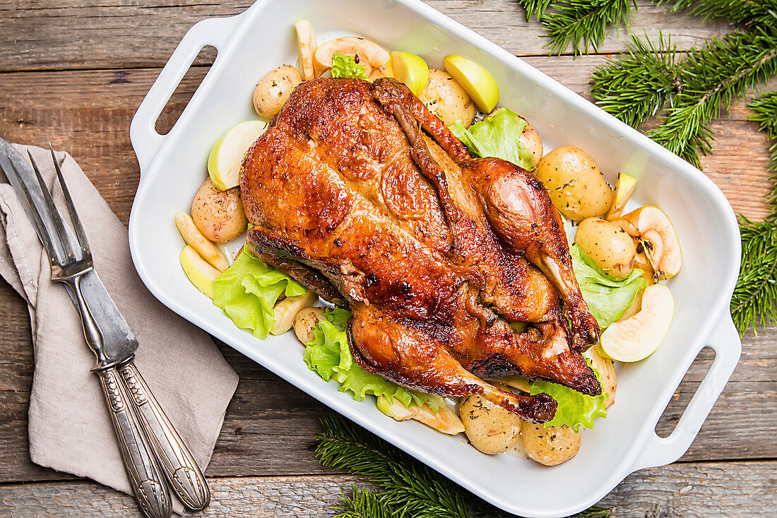 Christmas duck with apples and herbs