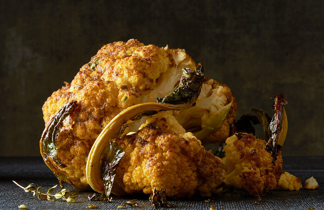 Whole head of cauliflower roasted with thyme