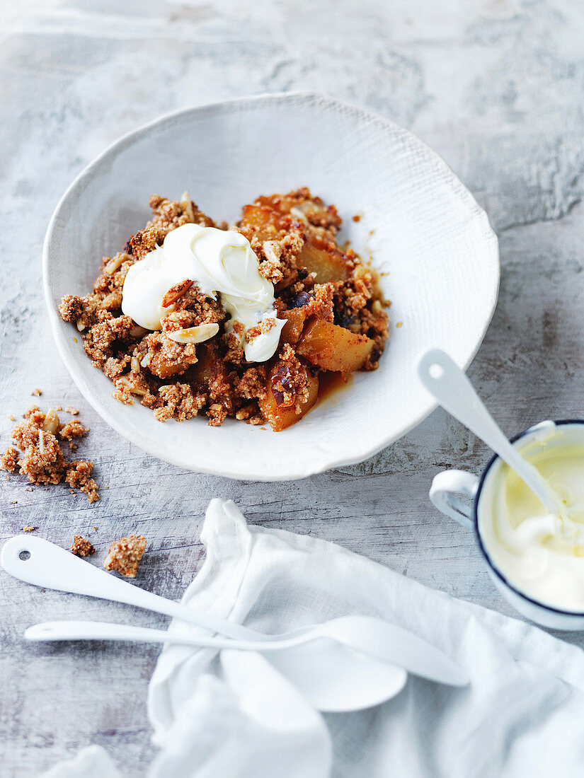 Pear and coconut crumble with with double-thick cream