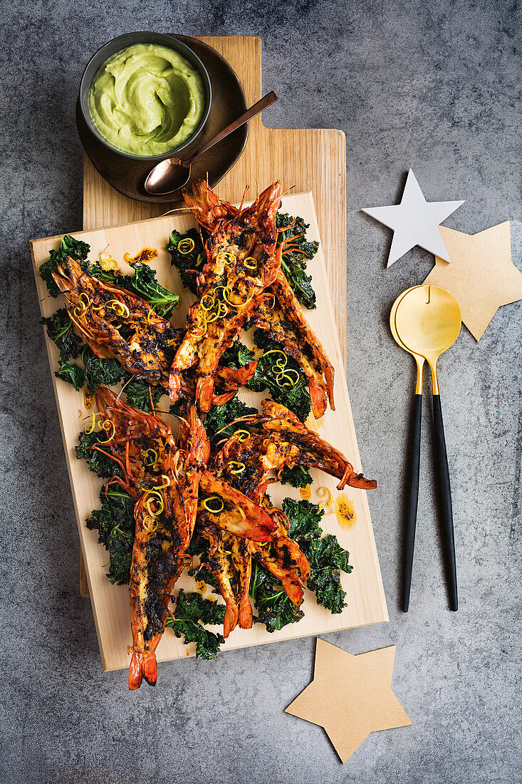 Grilled king prawns with kale and avocado purée