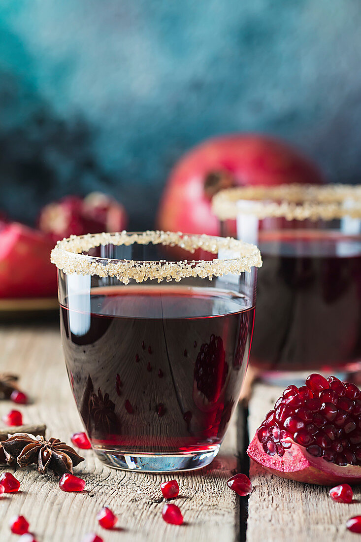 Healthy Pomegranate juice with fresh pomegranate fruits