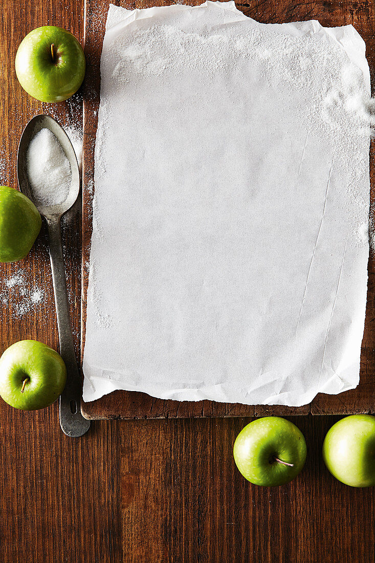 Green apples and baking paper