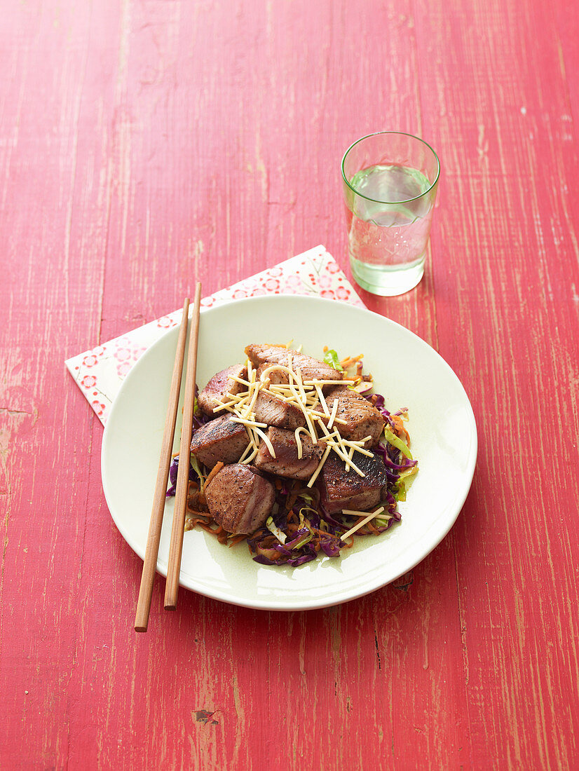 Stir-fried peppered tuna with asian coleslaw