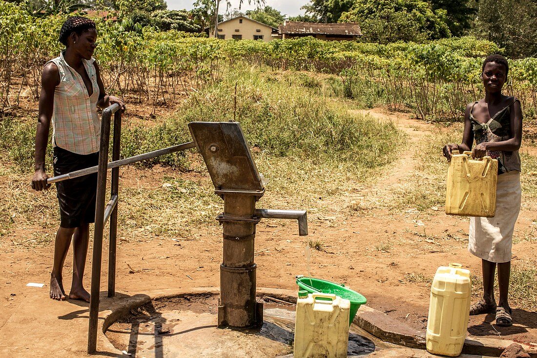 Women pumping water