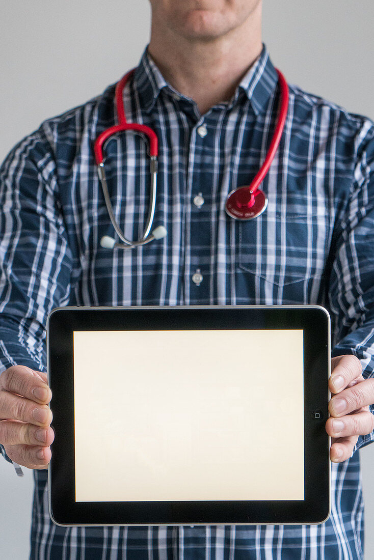 Doctor holding a digital tablet
