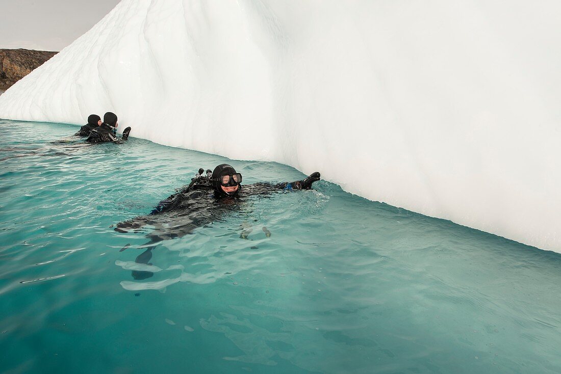 SCUBA diving next to iceberg in Eastern Greenland