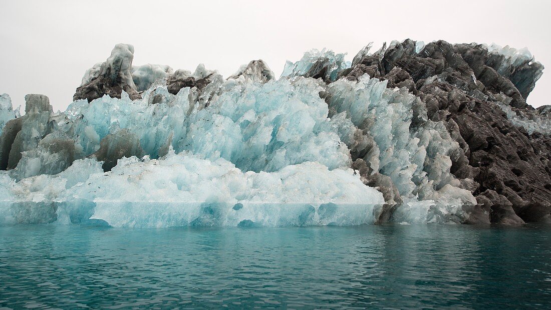 Discoloured iceberg in Rode Fjord, Greenland