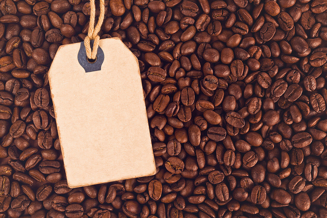 Price tag and coffee beans