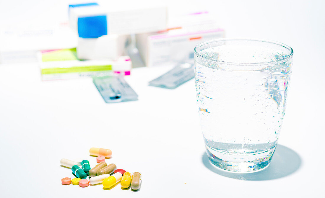 Medicines and glass of water