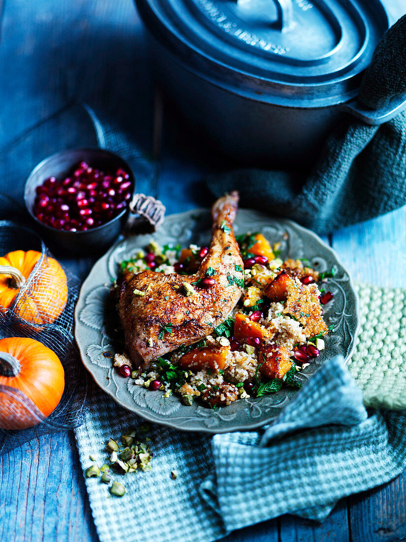 Spiced chicken with cous cous, pumpkin, mint and pomegranate
