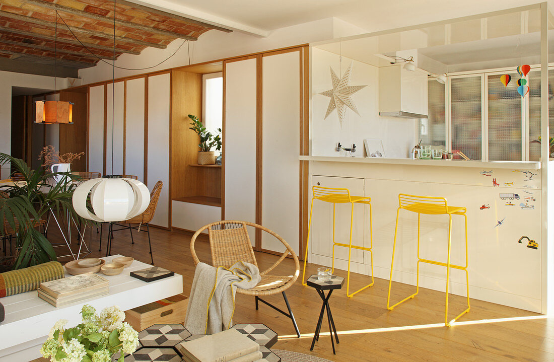Open-plan kitchen and fitted cupboards in Mediterranean interior