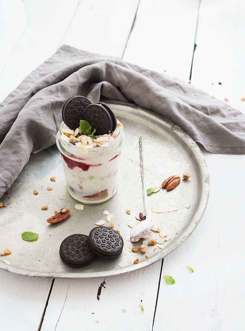 Yogurt oat granola with berries, honey, nuts and cookies