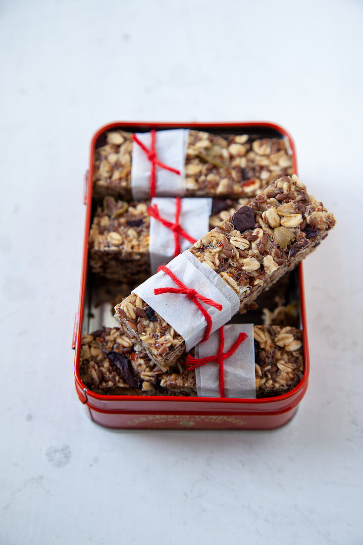 Oatmeal and olive bars in a metal box