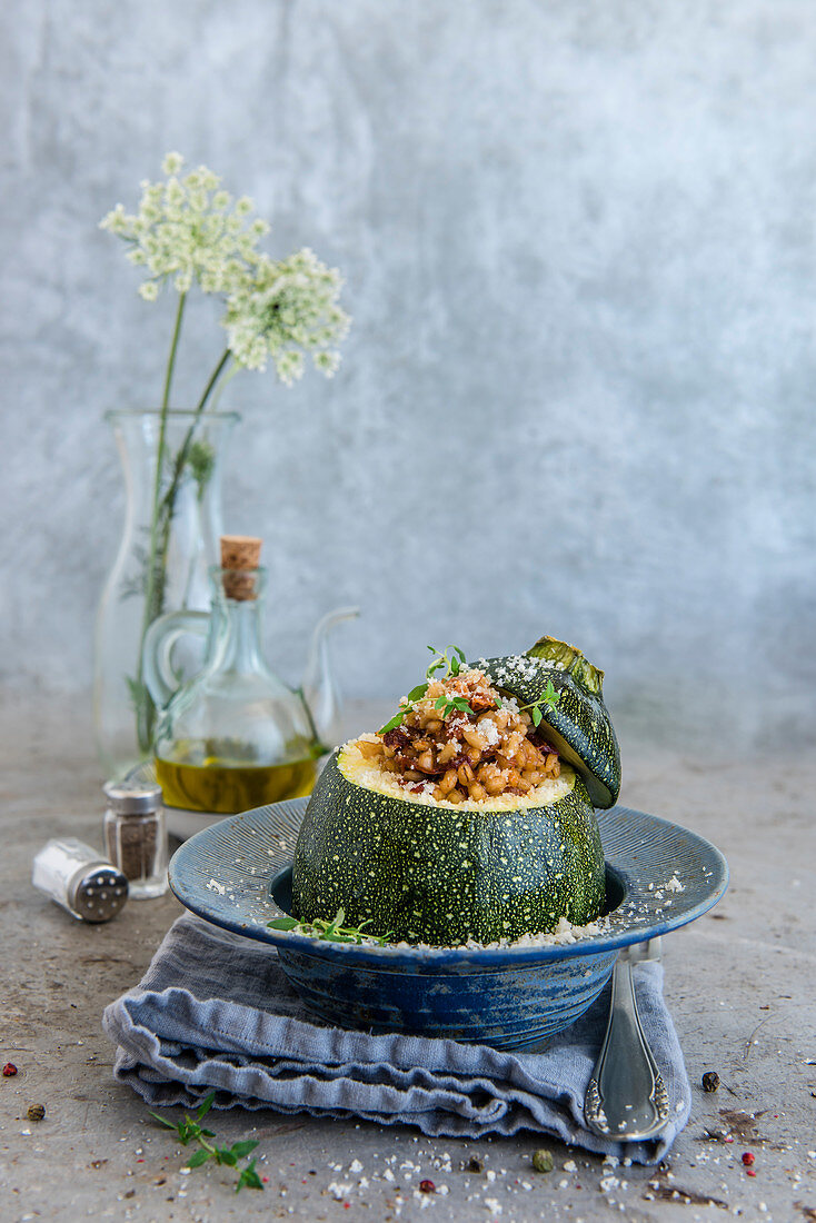 Round courgette filled with barley and dried tomatoes
