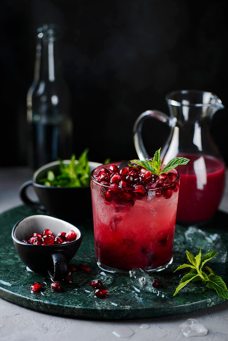 Pomegranate lemonade with ice and mint