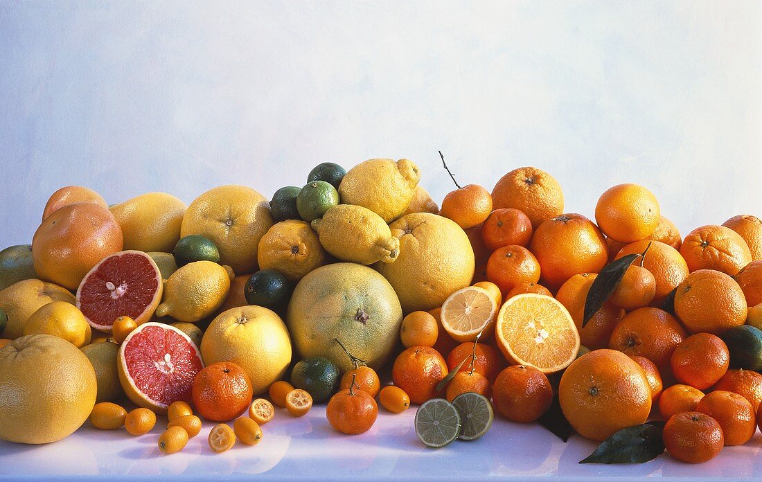An Assortment of Citrus Fruit; Whole and Halved