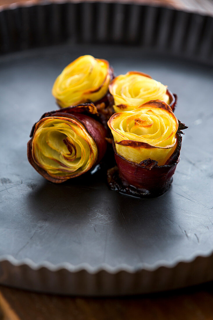 Potato roses wrapped in bacon